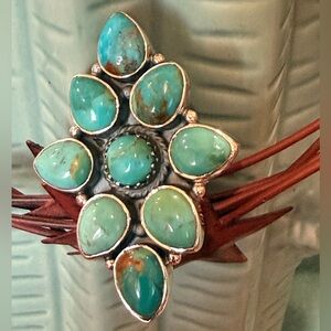 Gorgeous Kingman Turquoise 9 Stone Statement Ring
Sterling Silver .925